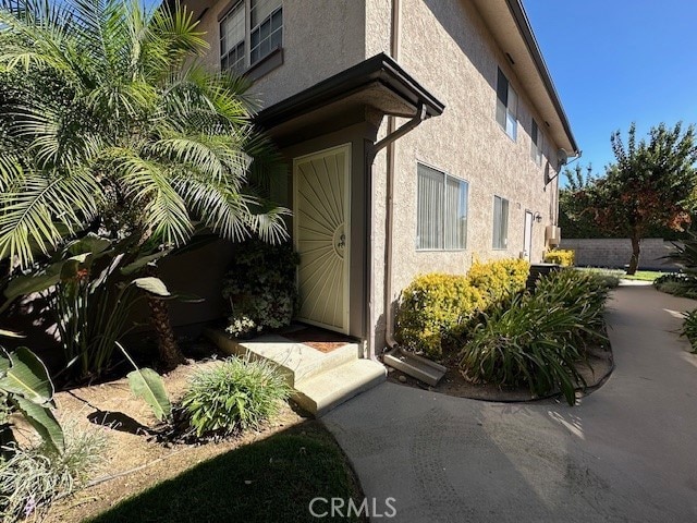 2070 Avenida Placida Unit 3, Simi Valley, CA 93063 - view of exterior entry with stucco siding