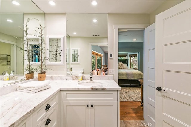 923 Lake Edge Way, Lake Arrowhead, CA 92352 - full bathroom featuring recessed lighting, vanity, connected bathroom, and wood finished floors