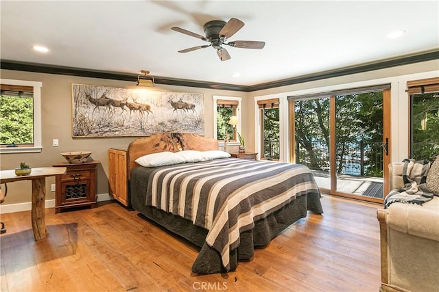 923 Lake Edge Way, Lake Arrowhead, CA 92352 - bedroom with ornamental molding, access to outside, wood finished floors, baseboards, and a ceiling fan
