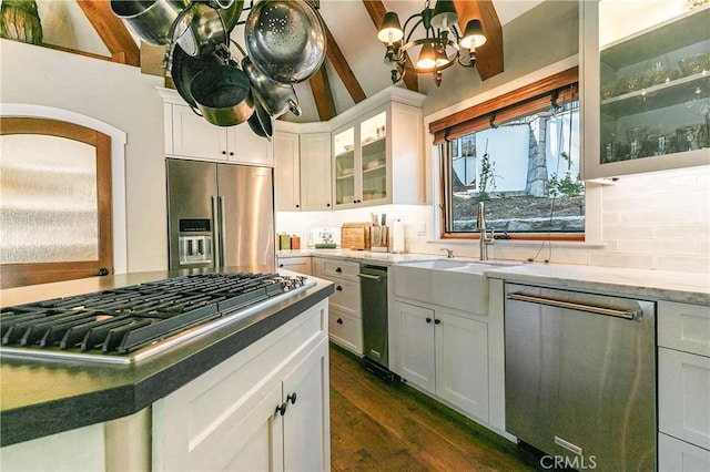 923 Lake Edge Way, Lake Arrowhead, CA 92352 - kitchen with appliances with stainless steel finishes, a sink, a chandelier, dark wood finished floors, and white cabinets