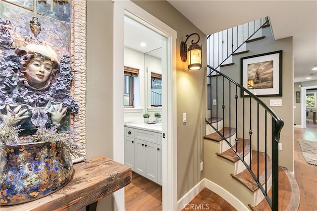 923 Lake Edge Way, Lake Arrowhead, CA 92352 - stairway featuring wood finished floors, recessed lighting, and baseboards
