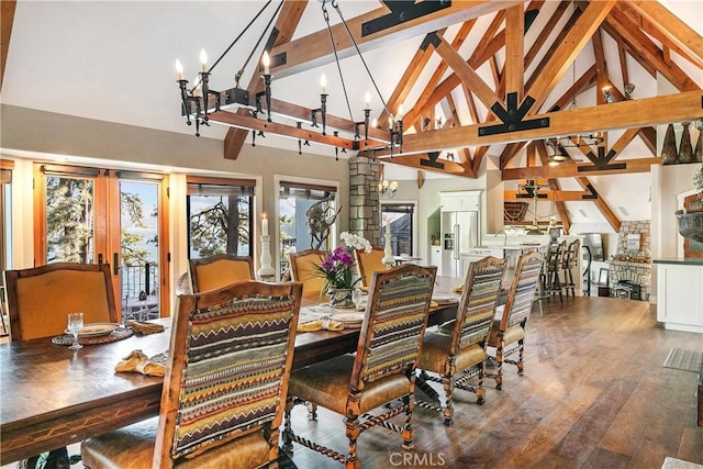 923 Lake Edge Way, Lake Arrowhead, CA 92352 - dining area with high vaulted ceiling, a chandelier, beamed ceiling, wood finished floors, and french doors