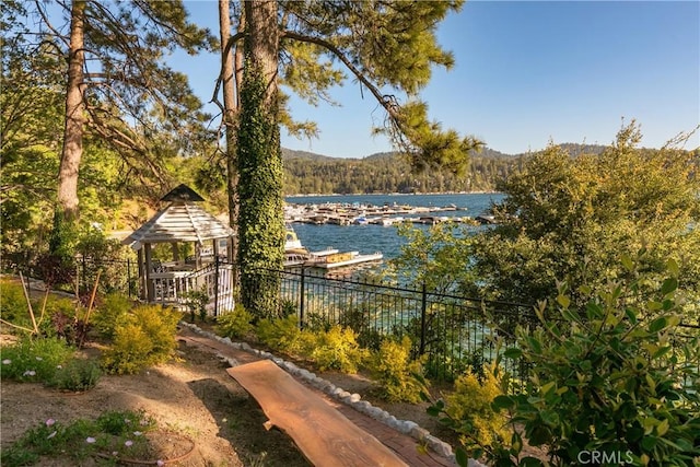 923 Lake Edge Way, Lake Arrowhead, CA 92352 - water view with a gazebo and a heavily wooded area