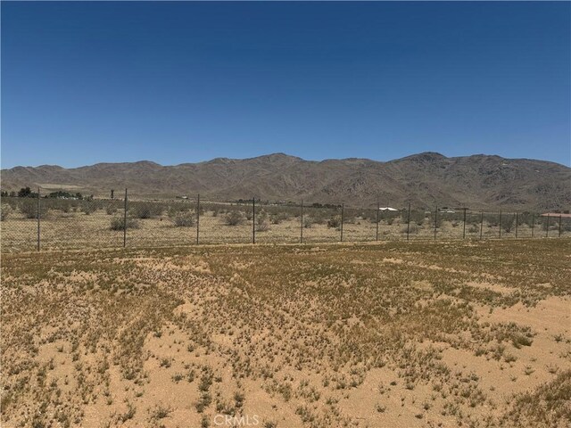 11725 Lagartijo Dr, Apple Valley, CA 92308 - view of mountain backdrop with rural landscape