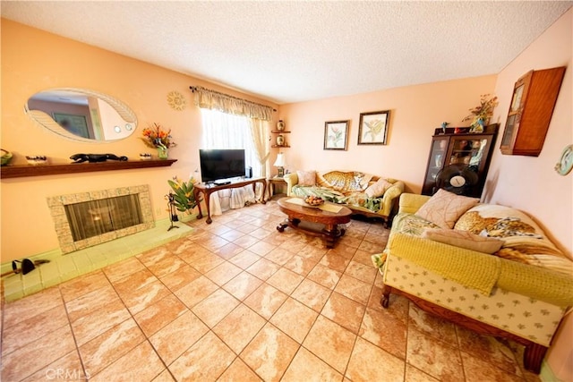 1921 Pine Dr, La Habra, CA 90631 - living room featuring a textured ceiling, a fireplace with raised hearth, and light tile patterned floors