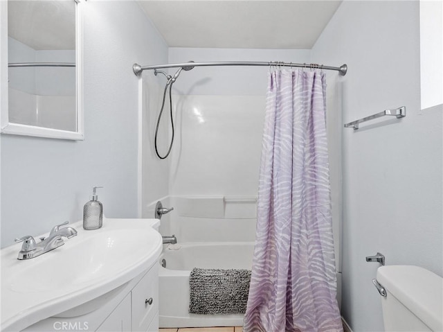 1040 Flora St, Barstow, CA 92311 - bathroom with shower / bath combo, toilet, and vanity