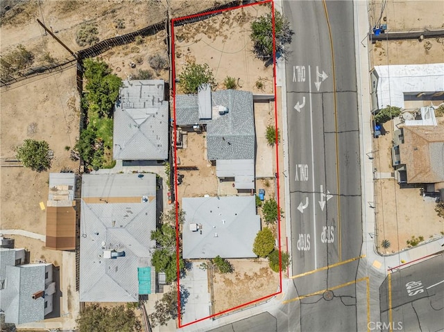 1040 Flora St, Barstow, CA 92311 - aerial overview of property's location with property parcel outlined