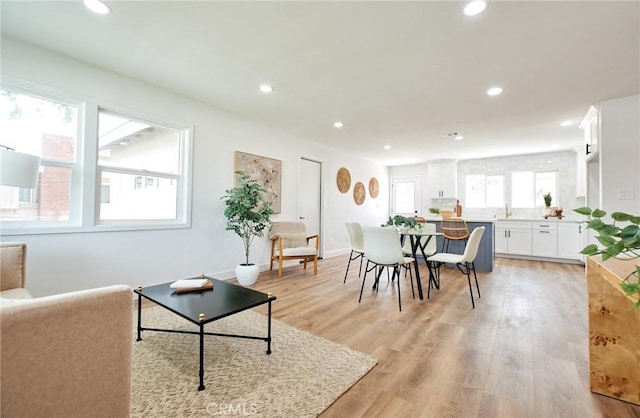 16417 Ivy Ave, Fontana, CA 92335 - living area with recessed lighting and light wood-style flooring