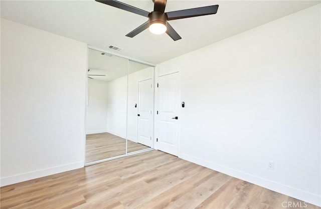 16417 Ivy Ave, Fontana, CA 92335 - unfurnished bedroom with light wood finished floors, baseboards, a closet, and a ceiling fan