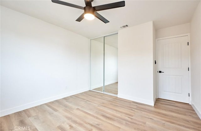 16417 Ivy Ave, Fontana, CA 92335 - unfurnished bedroom featuring a closet, light wood-style flooring, baseboards, and ceiling fan