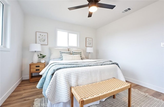 16417 Ivy Ave, Fontana, CA 92335 - bedroom featuring baseboards, light wood finished floors, and a ceiling fan