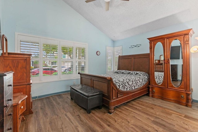 6919 Sandleford Way, San Diego, CA 92139 - bedroom featuring wood finished floors, a textured ceiling, high vaulted ceiling, and a ceiling fan