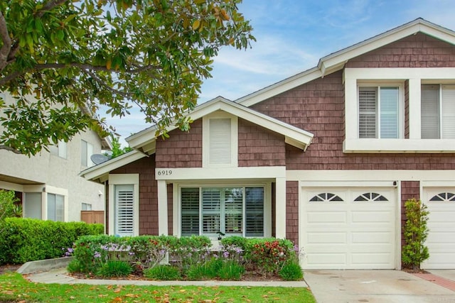 6919 Sandleford Way, San Diego, CA 92139 - view of property with driveway and an attached garage