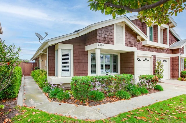 6919 Sandleford Way, San Diego, CA 92139 - view of front of house featuring an attached garage and concrete driveway