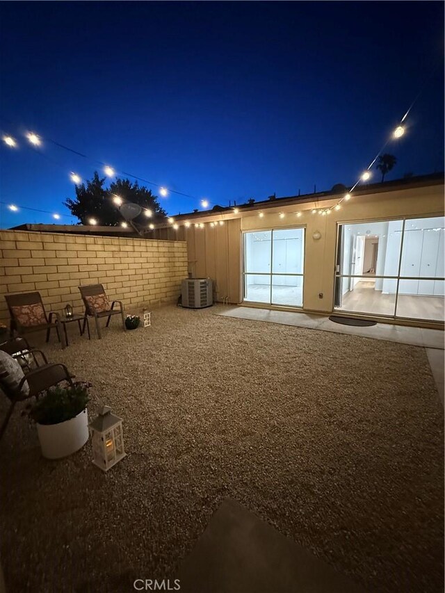 22789 Palm Ave Unit B, Grand Terrace, CA 92313 - yard at night featuring central AC unit