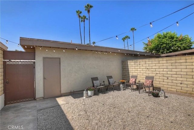 22789 Palm Ave Unit B, Grand Terrace, CA 92313 - back of property featuring stucco siding and a patio area