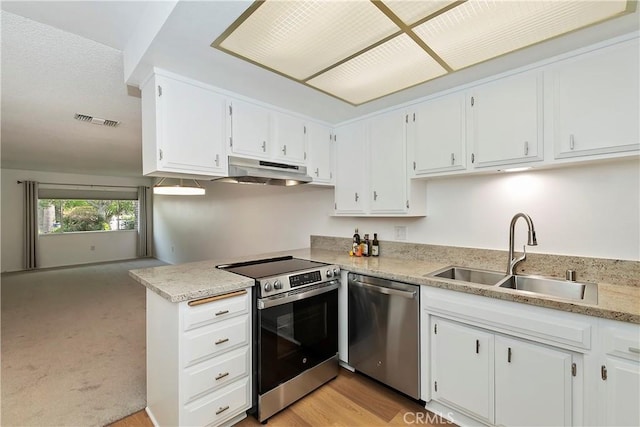 22789 Palm Ave Unit B, Grand Terrace, CA 92313 - kitchen featuring stainless steel appliances, a sink, under cabinet range hood, light countertops, and white cabinets