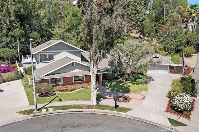 3016 Milagro Way, Fullerton, CA 92835 - view of front facade with a front lawn, brick siding, driveway, and roof with shingles