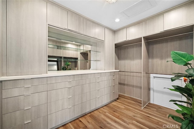 3016 Milagro Way, Fullerton, CA 92835 - walk in closet featuring light wood-style floors and attic access
