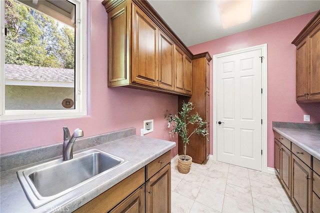 3016 Milagro Way, Fullerton, CA 92835 - kitchen with a sink, brown cabinets, and light countertops