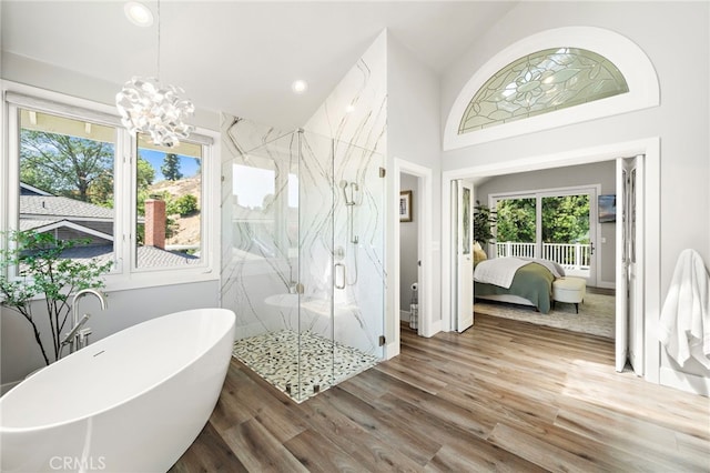 3016 Milagro Way, Fullerton, CA 92835 - ensuite bathroom with healthy amount of natural light, a marble finish shower, a soaking tub, a chandelier, and vaulted ceiling