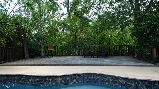 24530 Breckenridge Pl, Newhall, CA 91321 - view of swimming pool featuring a deck