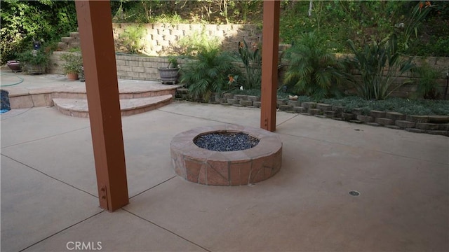 24530 Breckenridge Pl, Newhall, CA 91321 - view of patio featuring an outdoor fire pit