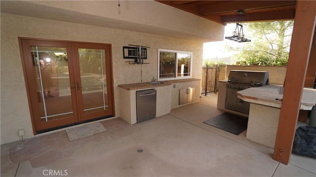 24530 Breckenridge Pl, Newhall, CA 91321 - view of patio / terrace featuring french doors and a sink