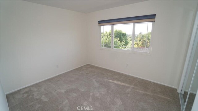 24530 Breckenridge Pl, Newhall, CA 91321 - spare room featuring carpet and baseboards