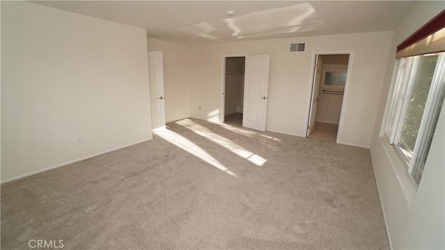 24530 Breckenridge Pl, Newhall, CA 91321 - unfurnished bedroom with carpet floors, a walk in closet, and baseboards