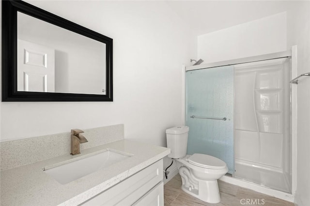 2101 W 76th St, Los Angeles, CA 90047 - bathroom with vanity, a stall shower, and toilet