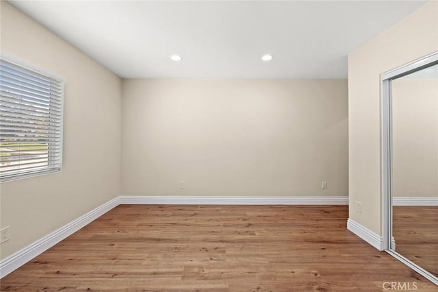 2101 W 76th St, Los Angeles, CA 90047 - unfurnished room with light wood-type flooring and recessed lighting