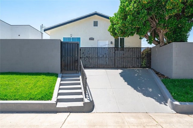 2101 W 76th St, Los Angeles, CA 90047 - gate featuring a fenced front yard