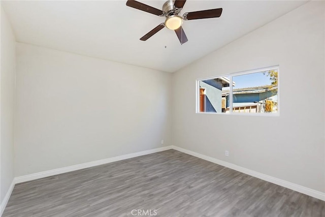 5951 Rose Ellen Ave Unit 29, Palms, CA 92277 - spare room featuring lofted ceiling, wood finished floors, baseboards, and ceiling fan
