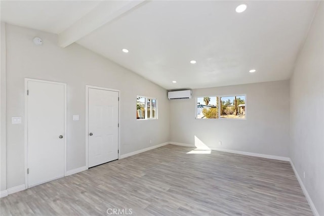 5951 Rose Ellen Ave Unit 29, Palms, CA 92277 - unfurnished room with a wall unit AC, light wood-type flooring, baseboards, recessed lighting, and a smoke detector