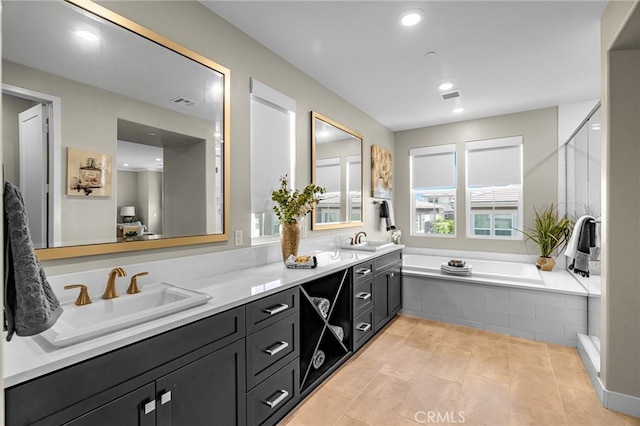 62 Pelican Ln, Irvine, CA 92618 - full bath featuring double vanity, a garden tub, tile patterned floors, a shower with shower door, and recessed lighting