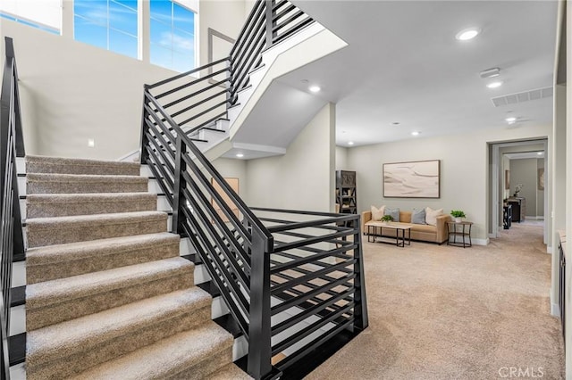 62 Pelican Ln, Irvine, CA 92618 - stairway featuring carpet, baseboards, and recessed lighting