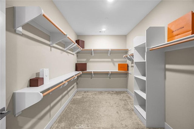62 Pelican Ln, Irvine, CA 92618 - walk in closet featuring light colored carpet
