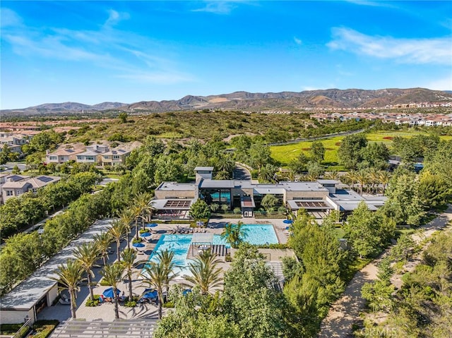 62 Pelican Ln, Irvine, CA 92618 - aerial view of residential area with a pool and a mountain backdrop