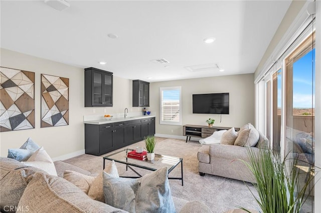 62 Pelican Ln, Irvine, CA 92618 - living area with light colored carpet, baseboards, and recessed lighting