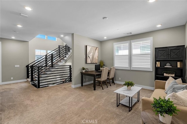 62 Pelican Ln, Irvine, CA 92618 - living room featuring healthy amount of natural light, light carpet, recessed lighting, and baseboards