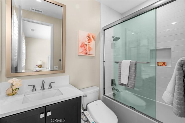62 Pelican Ln, Irvine, CA 92618 - bathroom with vanity, shower / bath combination with glass door, and toilet