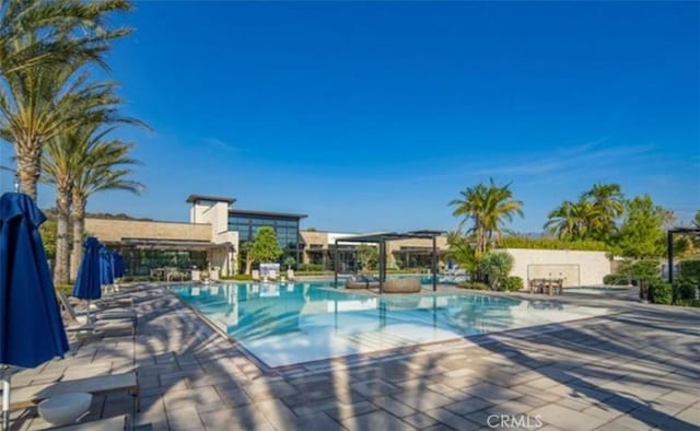 62 Pelican Ln, Irvine, CA 92618 - community pool featuring a patio