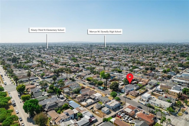 939 E 97th St, Los Angeles, CA 90002 - aerial overview of property's location with nearby suburban area