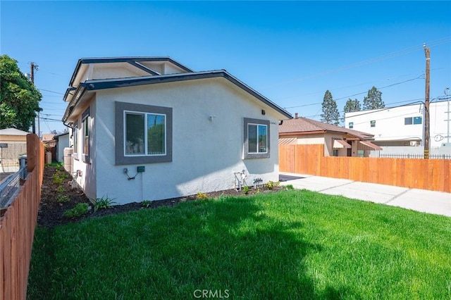 939 E 97th St, Los Angeles, CA 90002 - view of side of property with stucco siding
