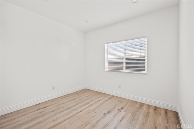 939 E 97th St, Los Angeles, CA 90002 - empty room featuring baseboards, wood finished floors, and recessed lighting