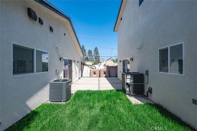 939 E 97th St, Los Angeles, CA 90002 - view of yard featuring central AC unit and a patio