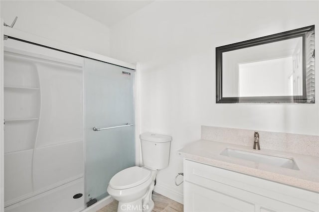939 E 97th St, Los Angeles, CA 90002 - full bathroom with vanity, a shower stall, toilet, and baseboards
