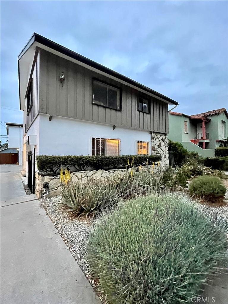 4123 Edenhurst Ave Unit 1, Los Angeles, CA 90039 - view of front of house featuring stone siding and board and batten siding