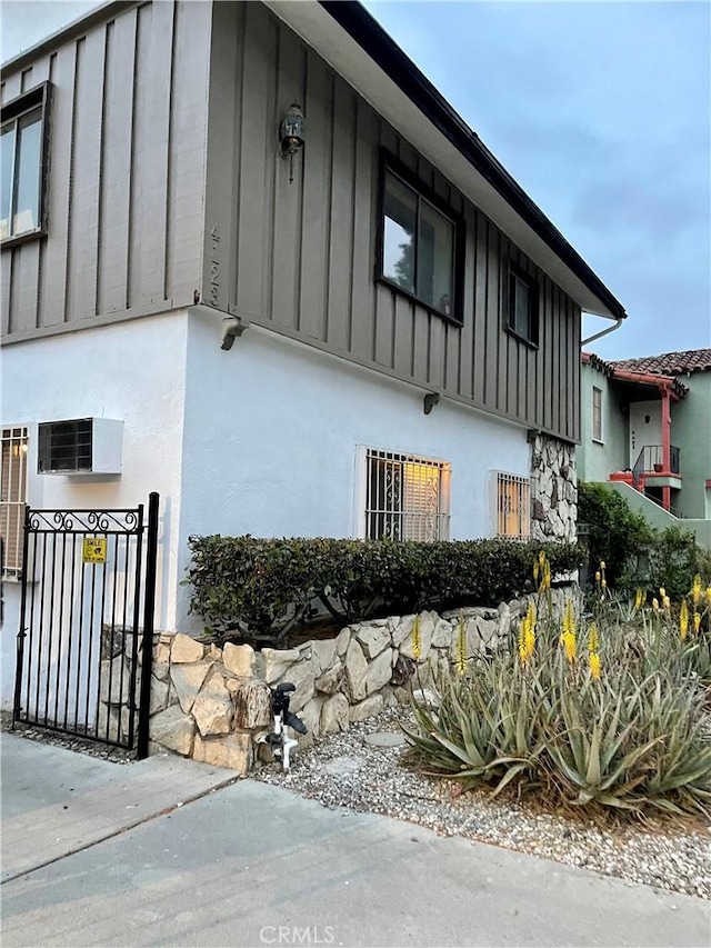 4123 Edenhurst Ave Unit 1, Los Angeles, CA 90039 - view of home's exterior featuring board and batten siding and stucco siding